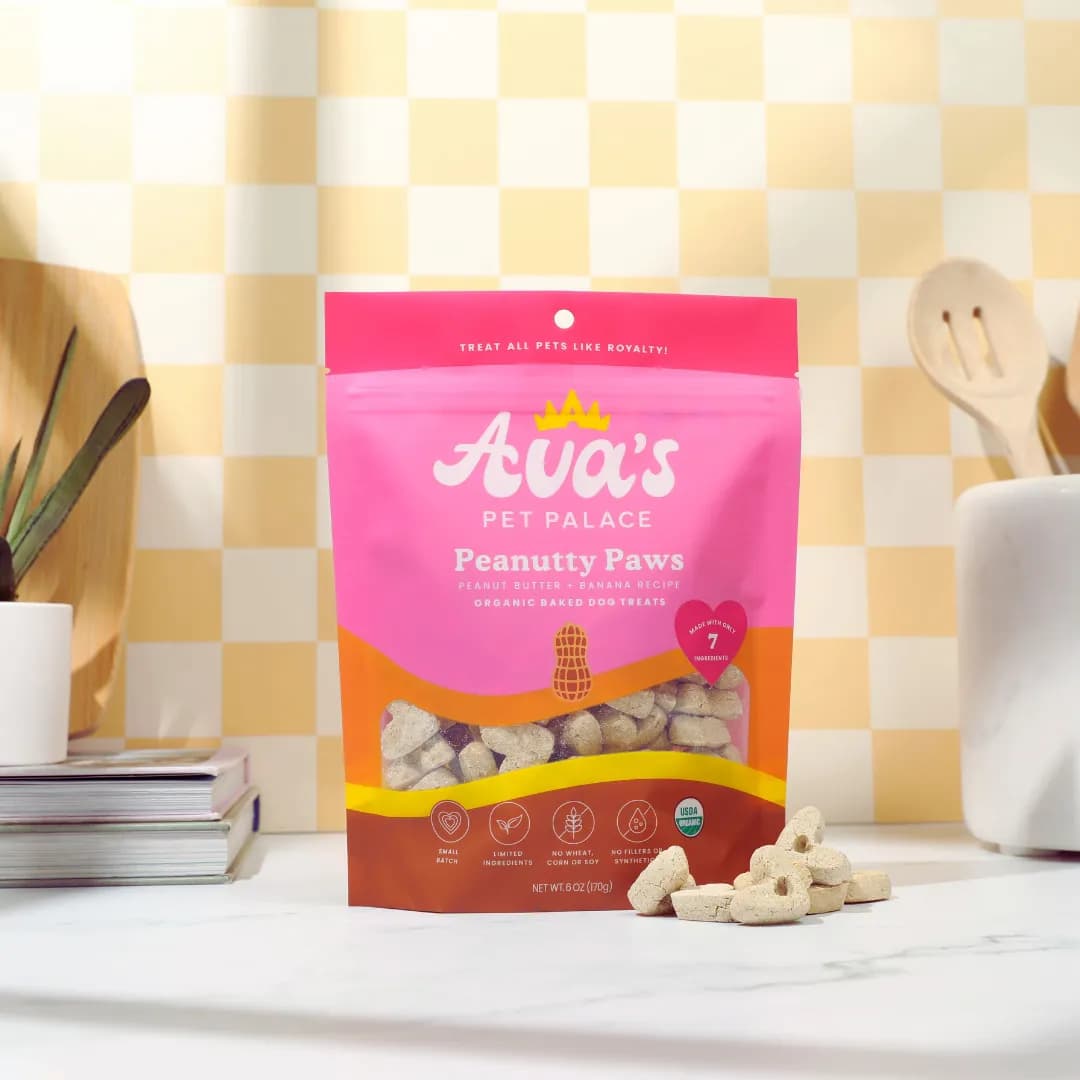 Peanutty Paws organic baked dog treats on a kitchen counter